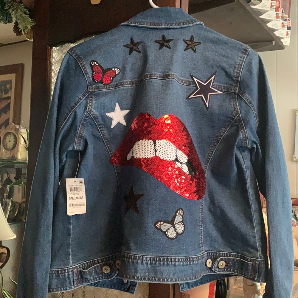 NWT… unique Jean jacket , Custom patch work on back. Red/ black patches